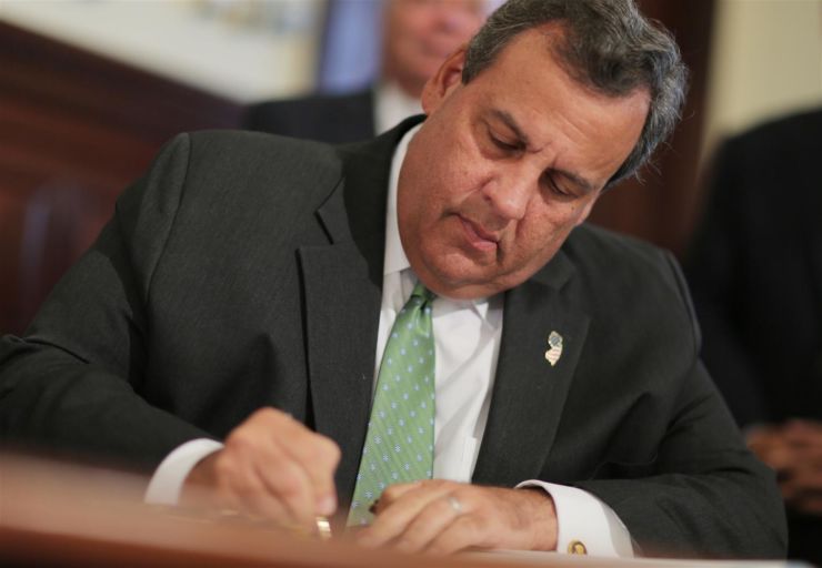 Governor Chris Christie signs S-1923 which prohibits investment of state pension and annuity funds by the State in companies that boycott goods, products or businesses of Israel while at the Statehouse in Trenton, N.J. on Tuesday, Aug. 16, 2016. Gathered around the Governor is, from right to left, Assemblywoman Valerie Vainieri Huttle, Assemblywoman Nancy Pinkin, Senator James Beach, Assemblyman Jon Bramnick, and Assemblyman Anthony Bucco (Governor's Office/Tim Larsen)
